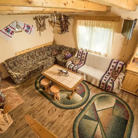 Coliba De La Rapa Case de vacanță